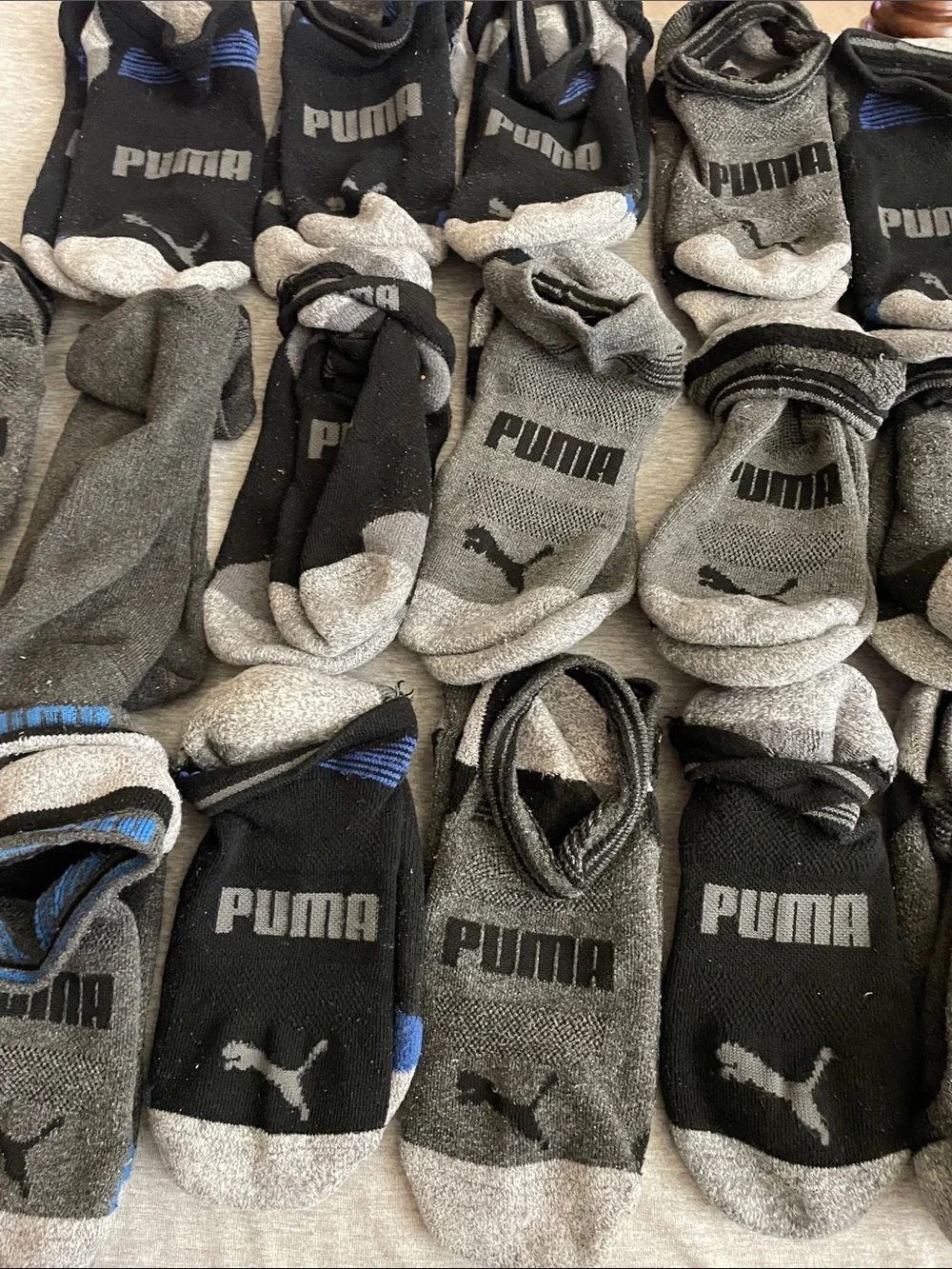 17 pairs of Puma Men's No-Show Athletic Socks in Black and Gray with Blue Accent